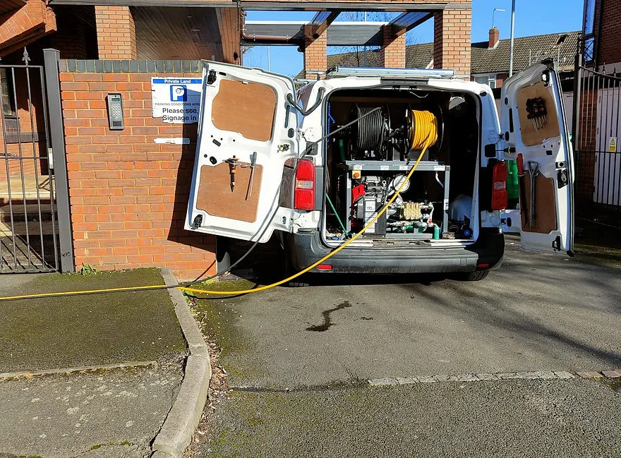 the back of a van with its doors open