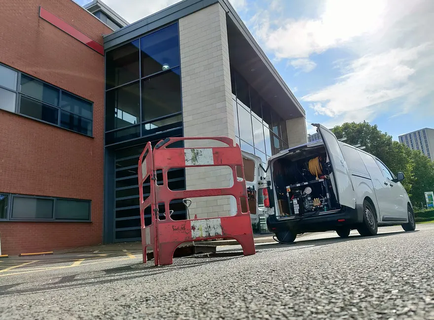 drainage van outside commercial building