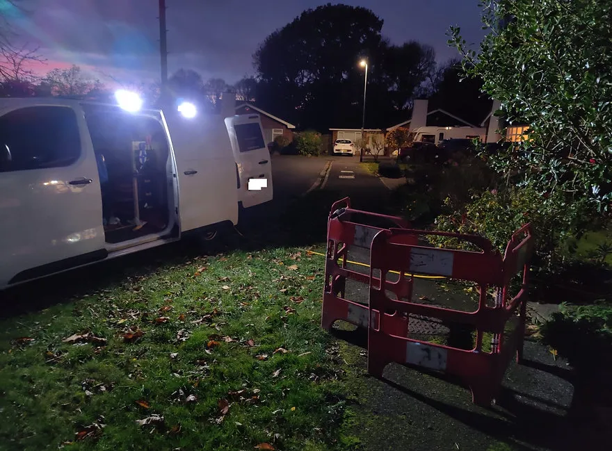 a white van parked next to a white van